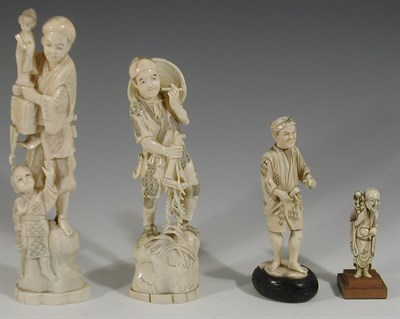 Lot 156 - A late 19th century Japanese carved ivory figure group