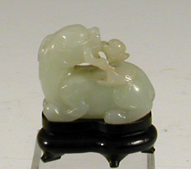 Lot 130 - A Chinese carved jade Dog of Fo