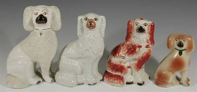 Lot 46 - Eight various pairs of 19th century Staffordshire seated spaniel figures (16)