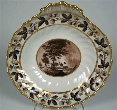 Lot 23 - A Flight & Barr scalloped oval single handled topographical fruit dish<br/>depicting Cowes Castle, Isle of Wight, circa 1795
