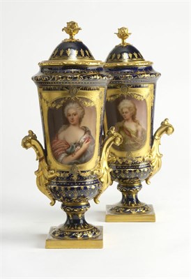 Lot 77 - A pair of late 19th century Rudolstadt Volkstedt twin handled vases and covers