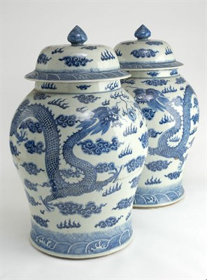 Lot 157 - A pair of large 19th century Chinese blue painted vases and covers