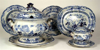 Lot 10 - A 19th century Ironstone china blue printed part dinner service